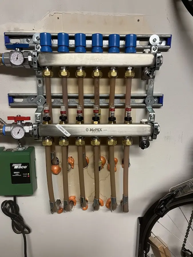 Plumber performing Water Heater Repair at a residential property in Hardyston